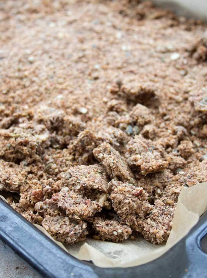 baked peanut butter granola clusters on a baking tray