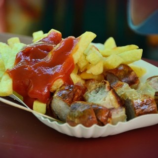 sausages and chips with ketchup