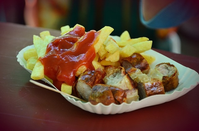 sausages and chips with ketchup