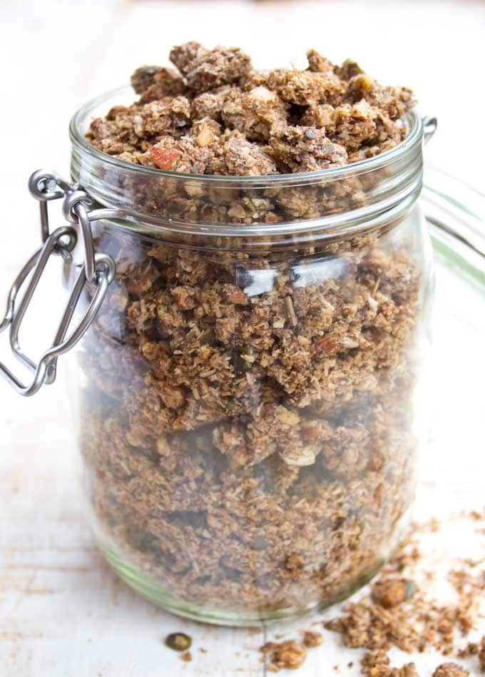 a glass jar filled with homemade grain free granola