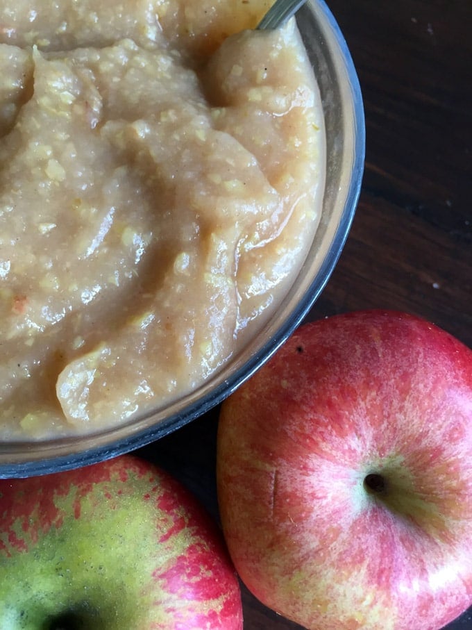 applesauce in a bowl with apples