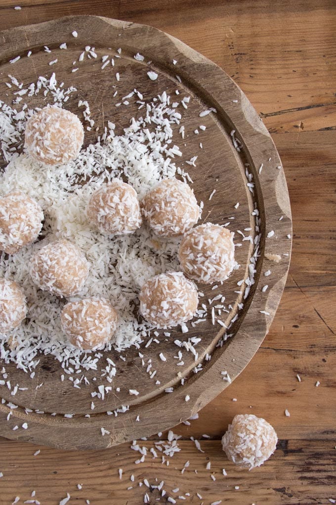 no bake almond flour balls topped with desiccated coconut 