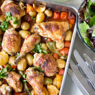 spanish chicken and chorizo tray bake with a side salad
