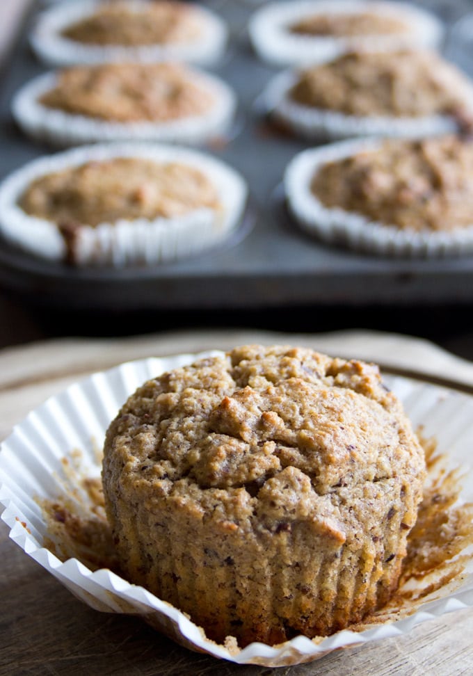 closeup of a low carb banana muffin with the paper case peeled away