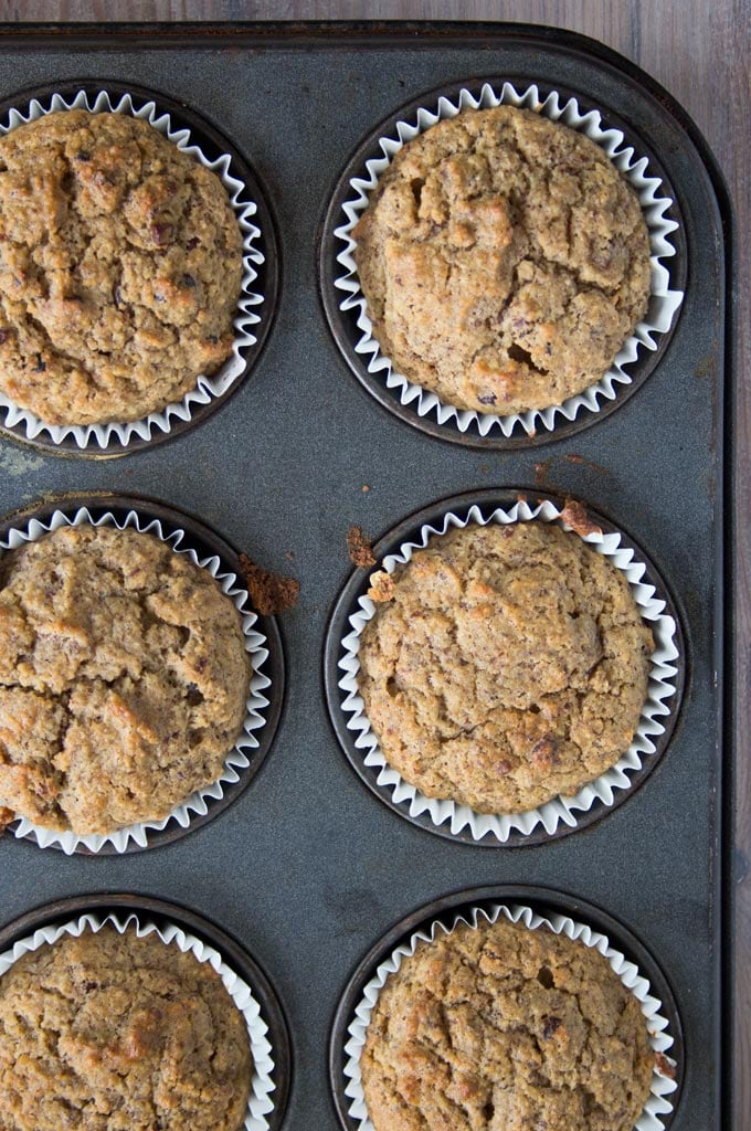 a baking tray with muffins