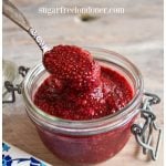 raspberry jam in a glass jar