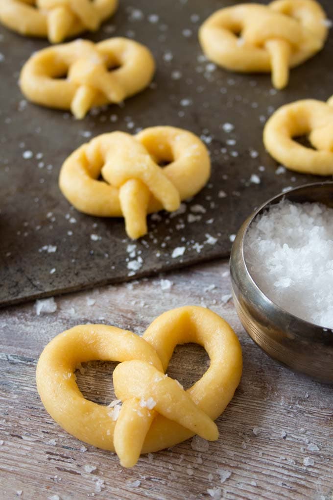 unbaked pretzels and a bowl of salt