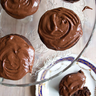 A cake stand with sugar free chocolate cupcakes