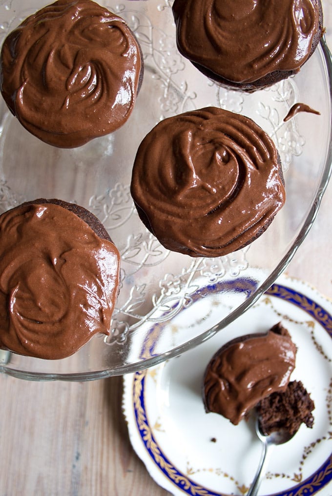 A cake stand with sugar free chocolate cupcakes