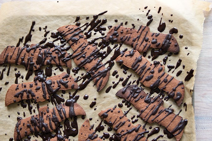 Halloween bat cookies drizzled with chocolate