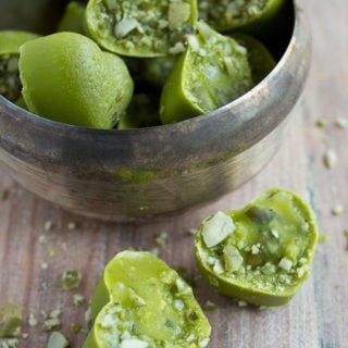 Matcha chocolates in a bowl.