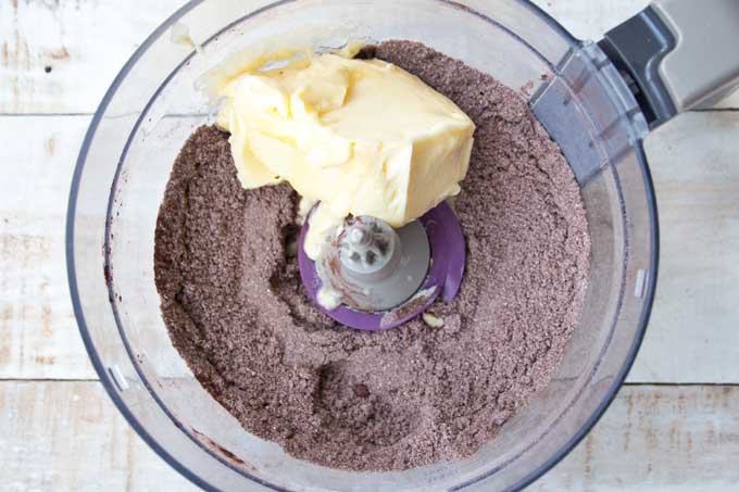 Mixed dry ingredients and butter in a bowl.