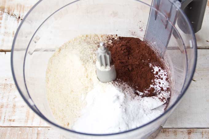 Ingredients in a food processor bowl.