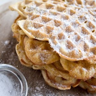 sugar free powdered sweetener on a stack of waffles