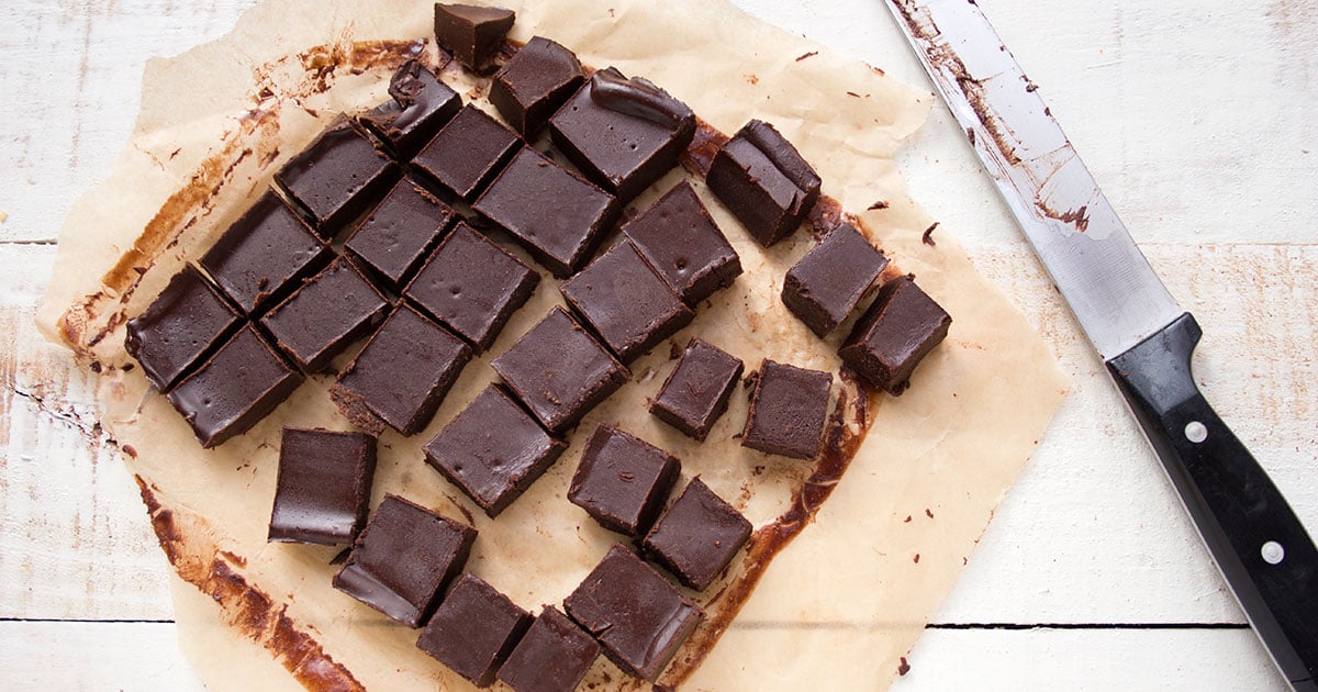 fudge cut into squares and a knife