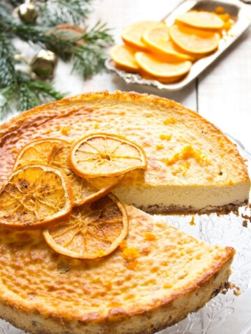 orange brandy cheesecake topped with orange slices