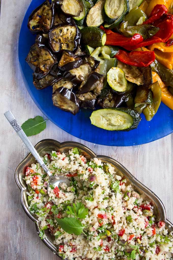 Moroccan spiced cauliflower rice and a plate of roasted vegetables