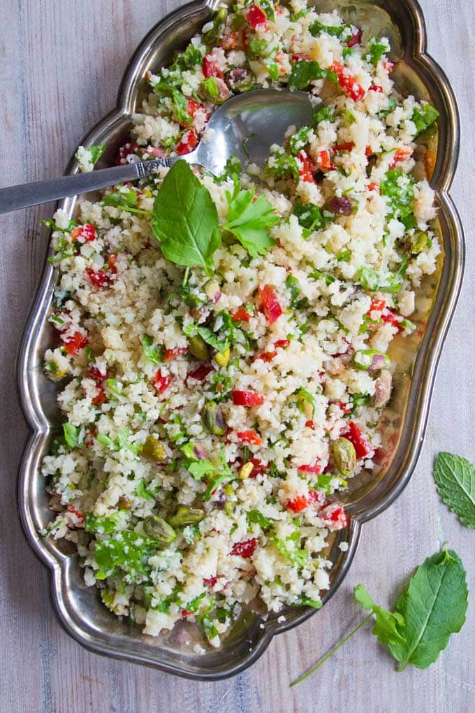 a tray with Moroccan cauliflower rice and a spoon