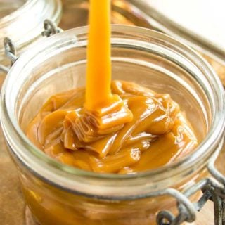 sugar free caramel sauce being poured into a glass jar