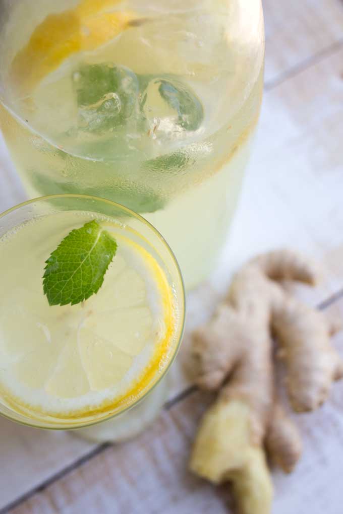 A jug and glass with homemade ginger ale