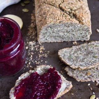 a loaf of paleo bread and a slice of bread with jam