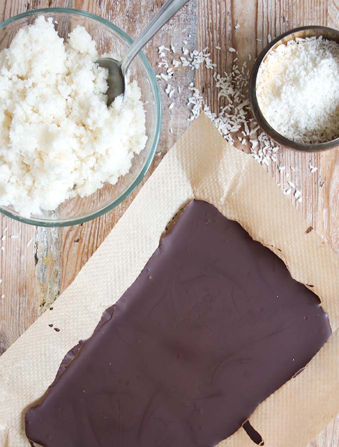 dark sugar free chocolate and a bowl with coconut filling 