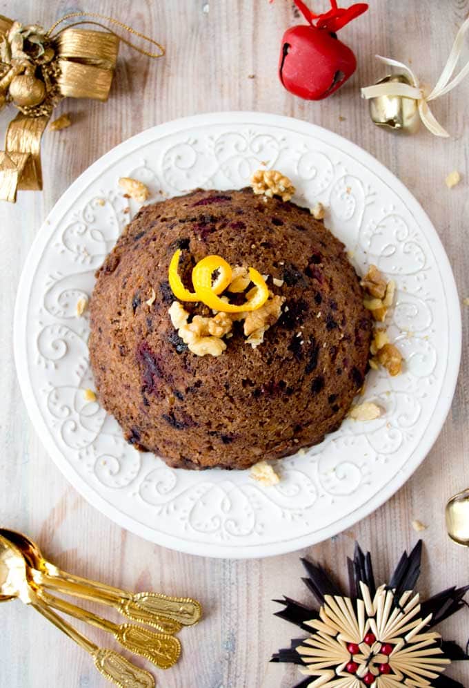 A low carb Christmas pudding with Christmas decoration on a table