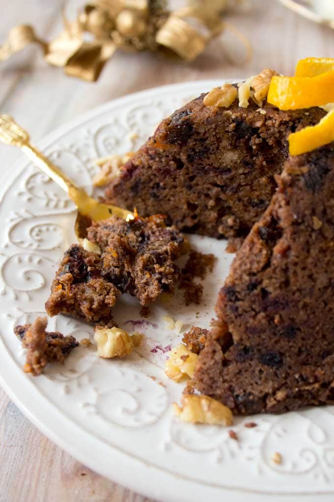 A low carb Christmas pudding on a plate with a spoon