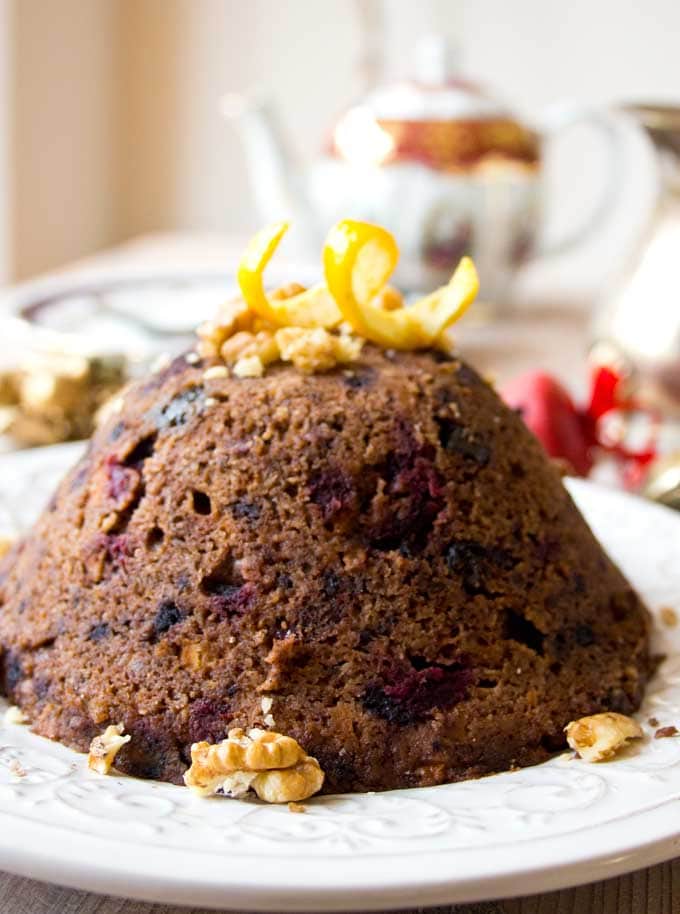 A low carb christmas pudding with orange peel decoration