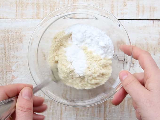 Stirring dry ingredients for sugar free lemon mug cake