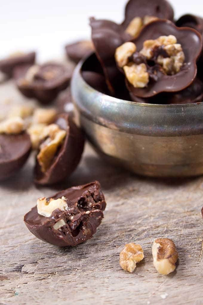 Close-up of a half-eaten chocolate walnut fat bomb