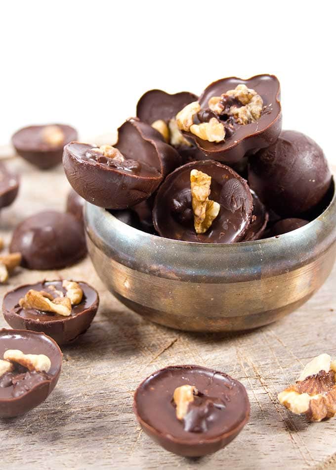 Chocolate walnut Keto fat bombs in a silver bowl