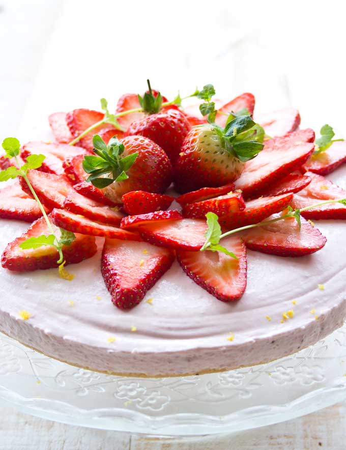 Give the oven a break with this fruity and easy no bake low carb strawberry cheesecake. It has an almond crust which also makes it gluten free. 