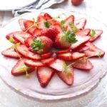 Give the oven a break with this fruity and easy no-bake low carb strawberry cheesecake. It has an almond crust which also makes this cake gluten free.