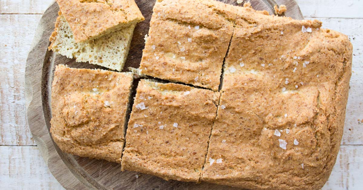 A soft, pillowy flaxseed bread that can be baked as a loaf, Focaccia-style or even as muffins. This bread uses coconut flour as a base and is delicious toasted. Great for low carb, gluten free and Paleo diets.   