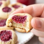 Raspberry thumbprint cookies are easy gluten free and low carb cookies with a fruity raspberry jam filling. They are perfect for low carb, Keto and sugar free diets. 