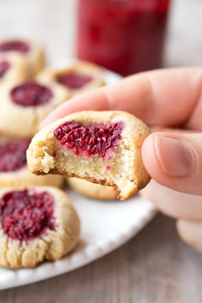 Close-up of a sugar free raspberry thumbprint cookie
