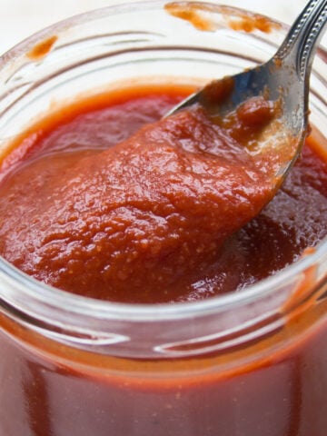 a glass jar with sugar free bbq sauce