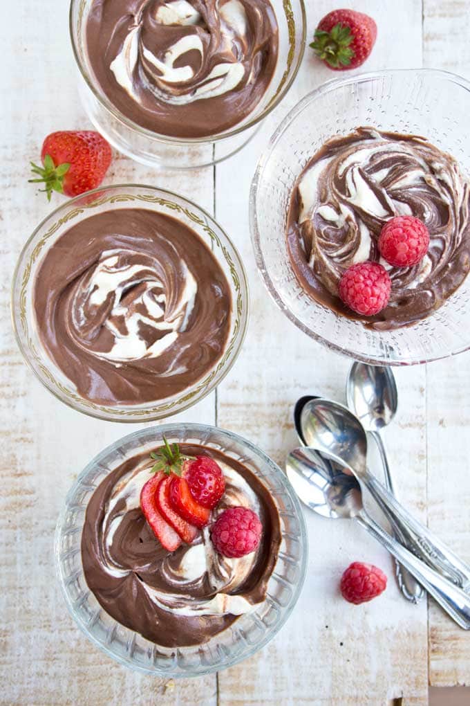 4 bowls of chocolate mascarpone mousse and spoons