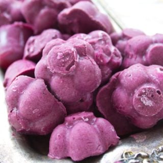 Tray with frozen blueberry bites