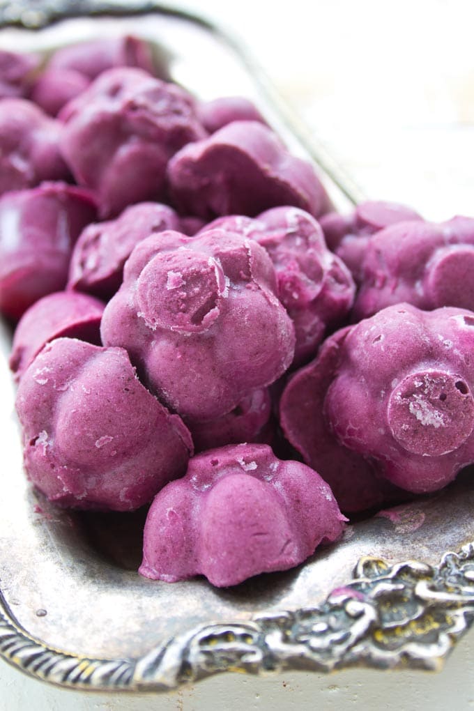 Tray with frozen blueberry bites