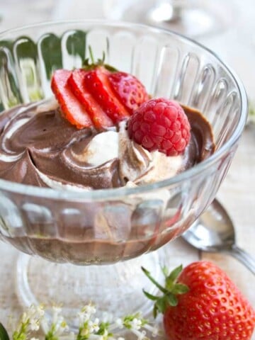 A bowl of chocolate mascarpone mousse with berries