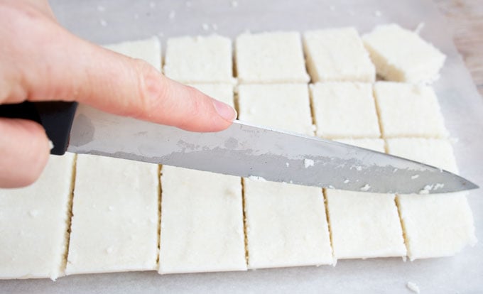 Cutting the finished bar with a knife into squares