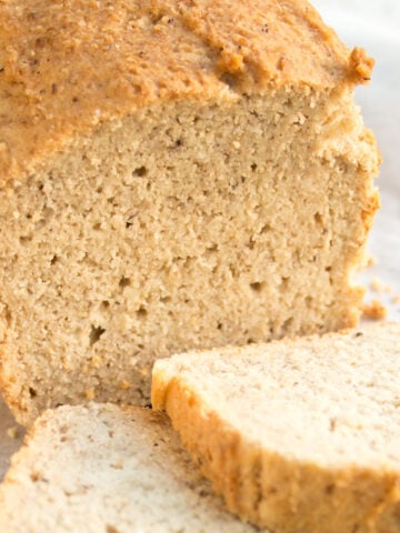 a loaf of almond flour bread sliced