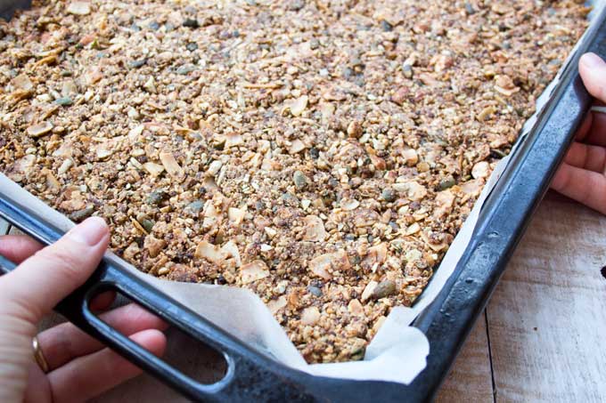 baked granola on a baking tray