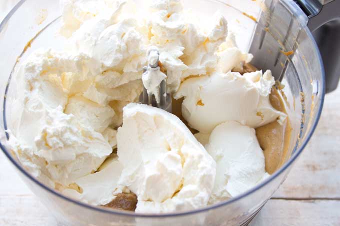 Adding the cream cheese to the filling mixture.