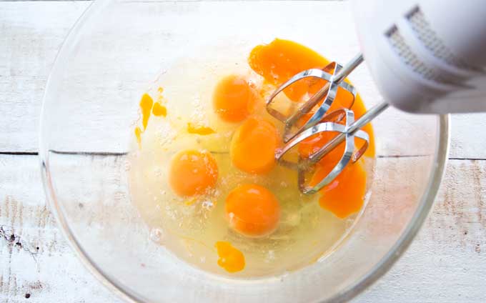 Eggs in a bowl with a mixer 