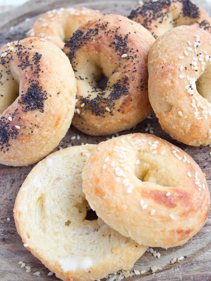 freshly baked bagels on a wooden board