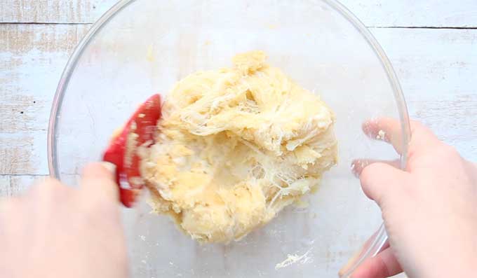Mixing fathead dough in a bowl