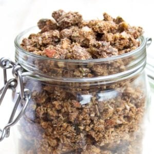 a glass jar with keto granola